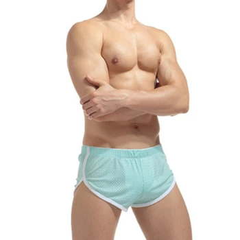 Мужчины Боковые раздельные спортивные шорты для бега Сексуальные нейлоновые дышащие трусы с низкой посадкой Мужские ледяные шелковые сетки Быстросохнущие спортивные штаны для бега